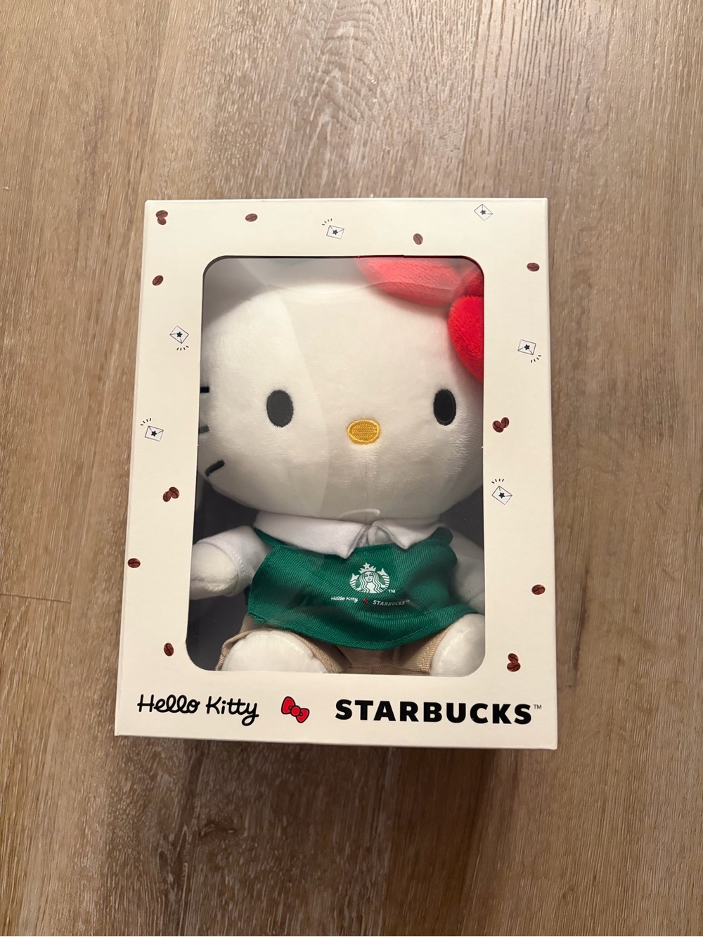 Sanrio Hello Kitty Plush in White with Red Bow and Green Apron